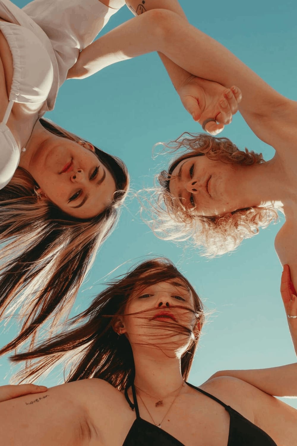 Women connecting in community at LionFlower Studio